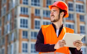 medium-shot-portrait-construction-engineer-holding-tablet